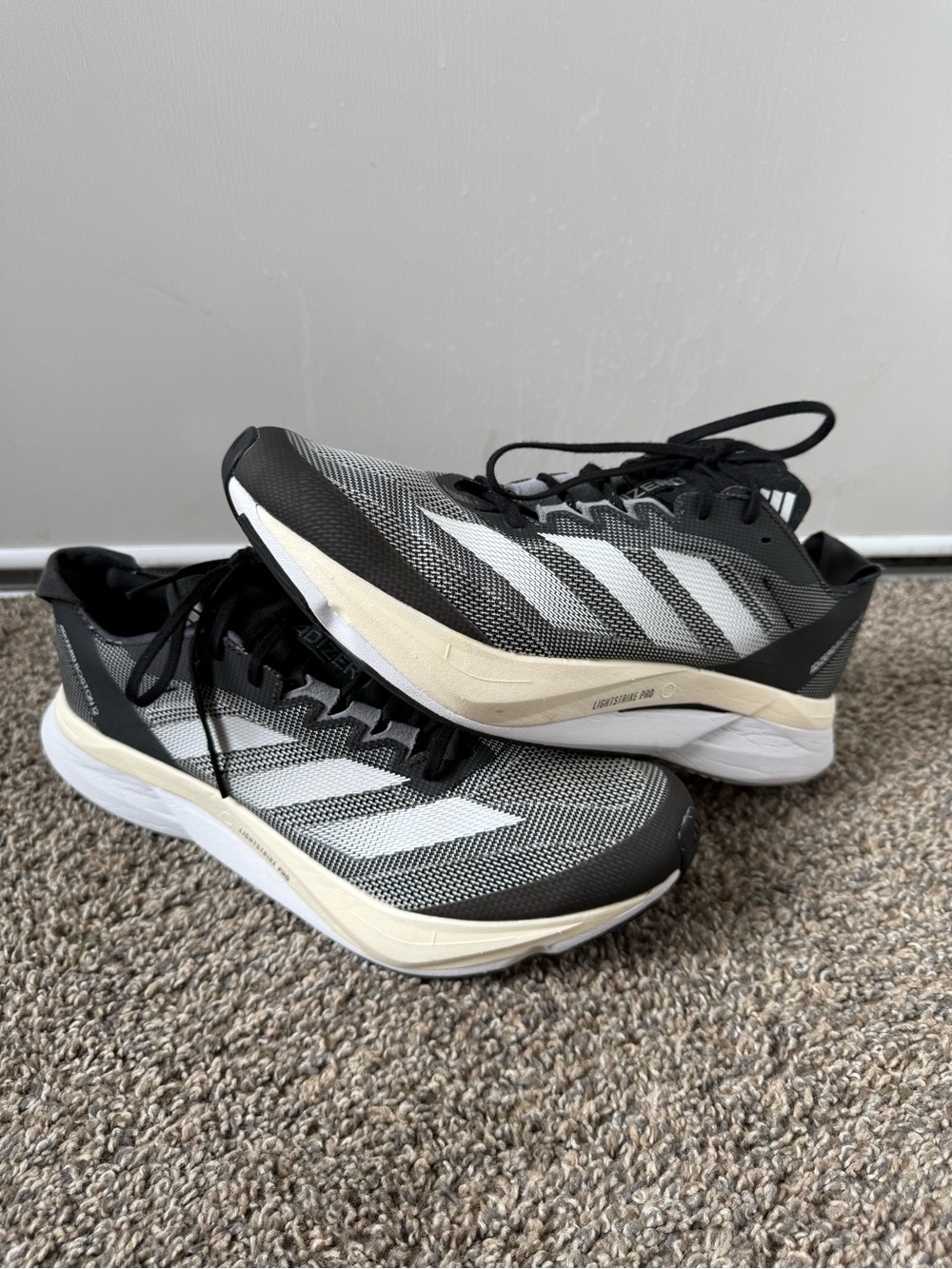 ADIZERO ligthstrike pro size 11 Men's Black, White and Cream Athletic Running